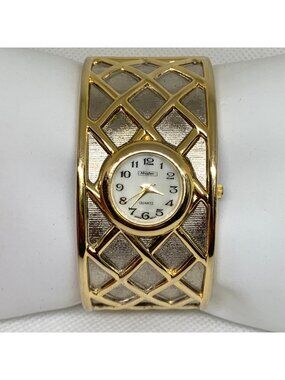 Mayfair women’s gold silver tone cuff bracelet watch wide 33mm mop dial running